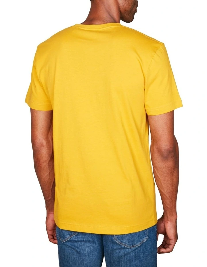 Embroidered Archive Shield T-Shirt in Dark Mustard Yellow