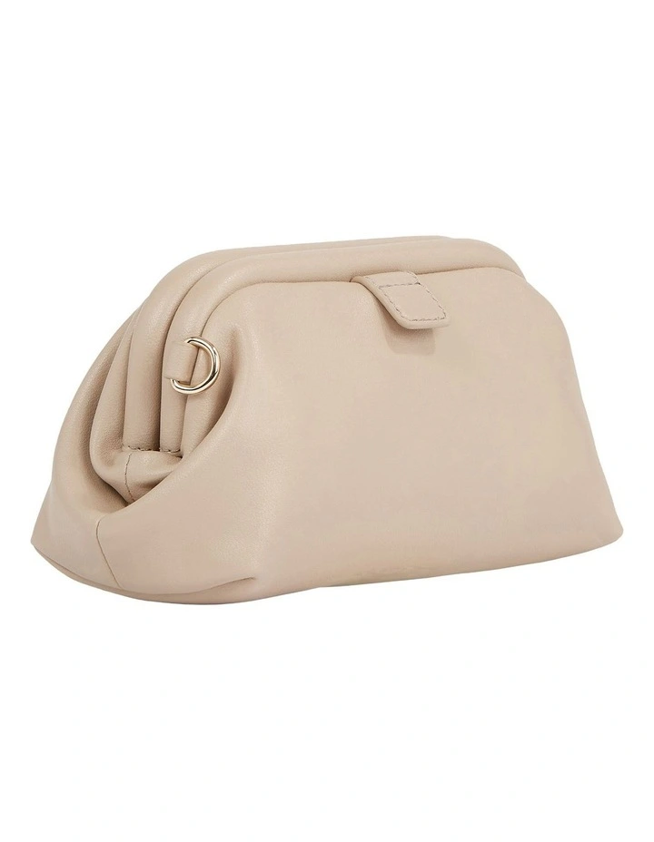 Reversible Monogram Plaque Crossover Bag in Beige