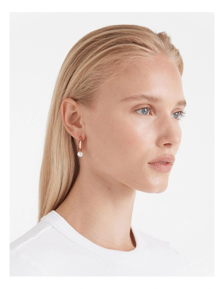 The Edge Pearl Huggie Hoop Earrings in Rose Gold