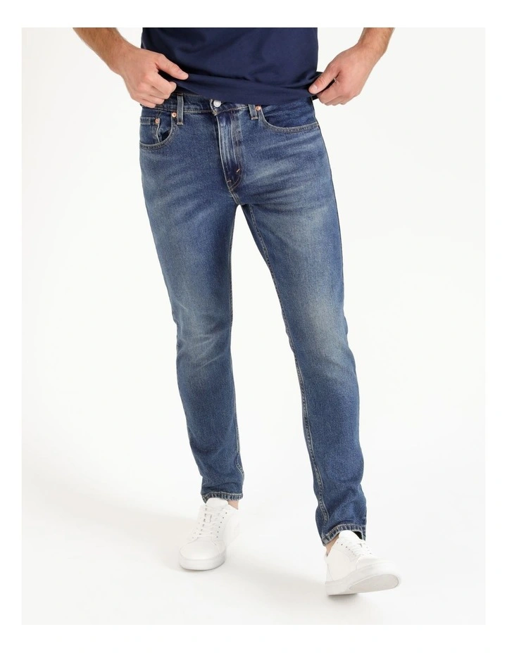 512 Tapered Slim Fit Jeans in Mid Blues