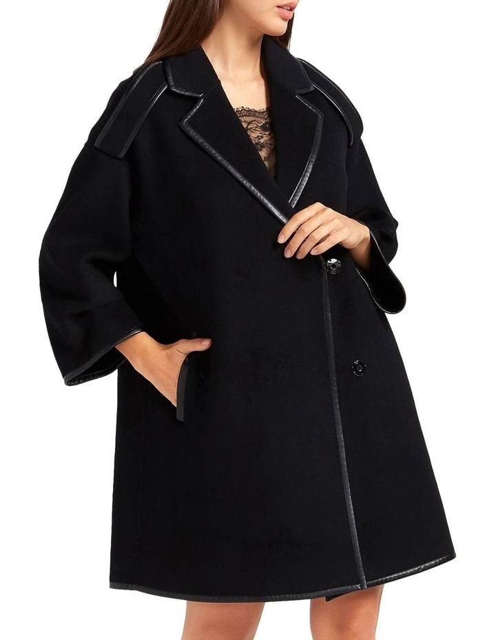Incomplete Kiss Trimmed Coat in Black