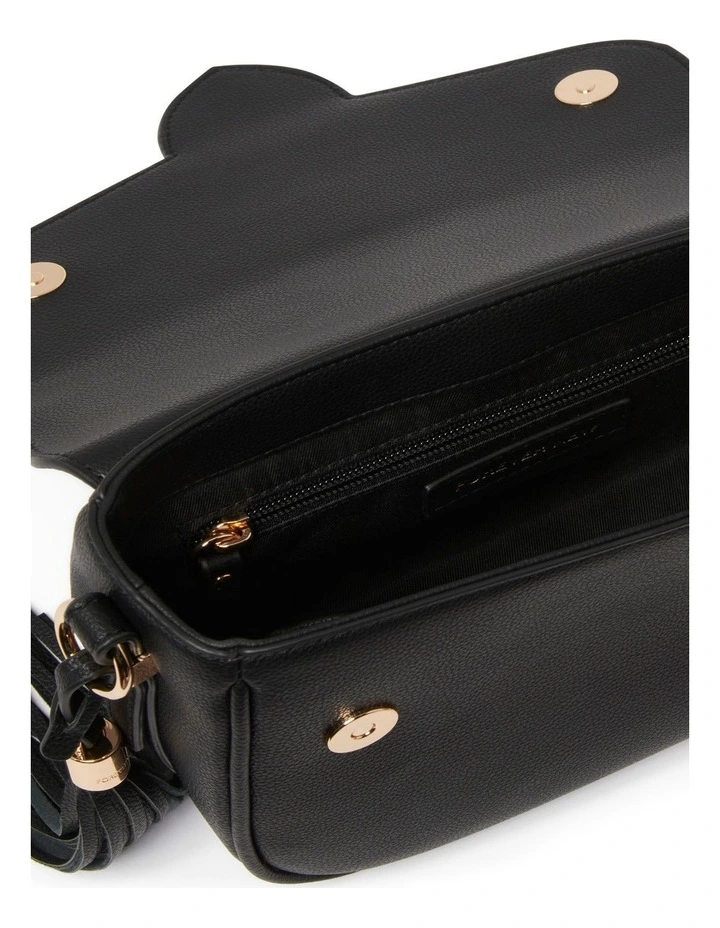 Signature Thea Tassel Saddle Bag in Black