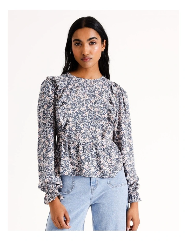 Eco Ruffle Shoulder Peplum Blouse in Multi
