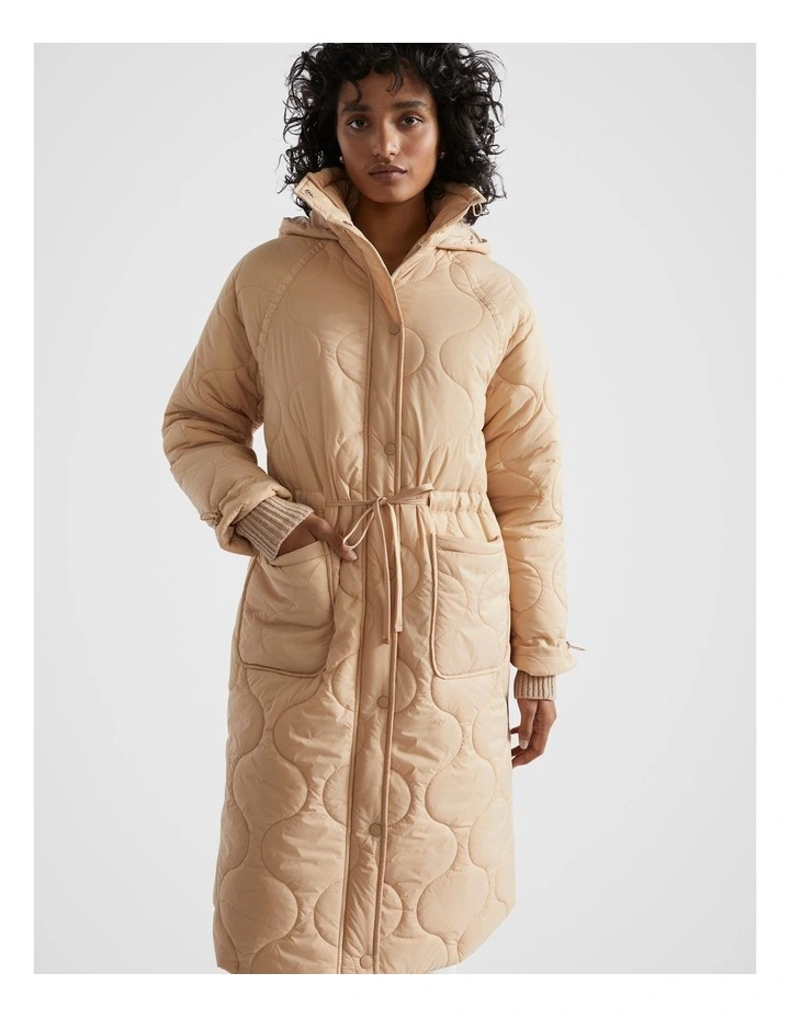 Longline Quilted Puffer Jacket in Champagne Beige