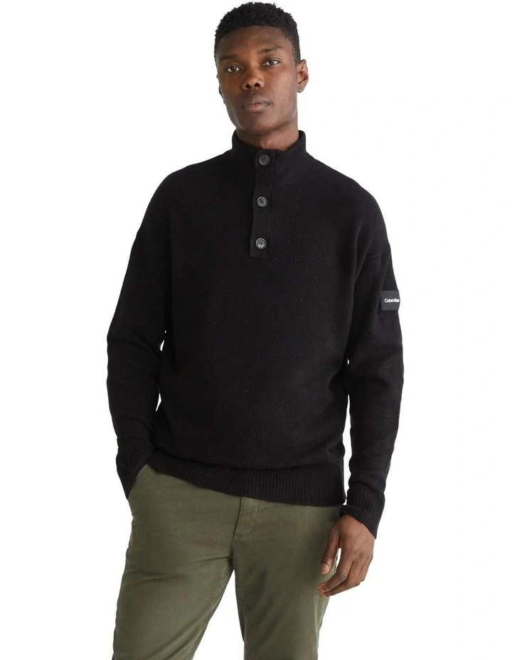 Lycra Blend Button Quarter Zip Knit Top in Black