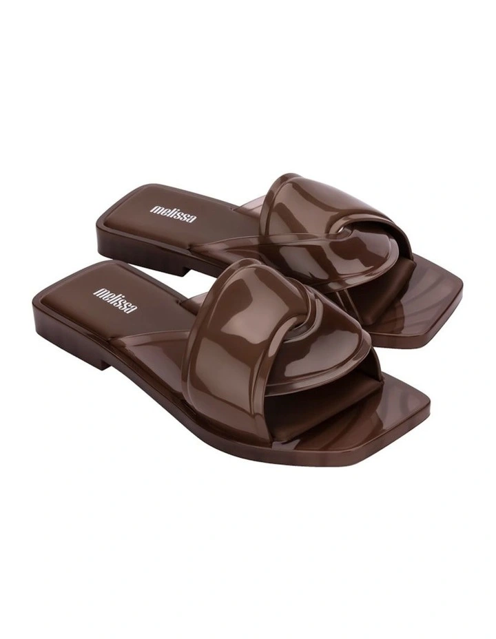 Melissa Brigitte Slides in Brown
