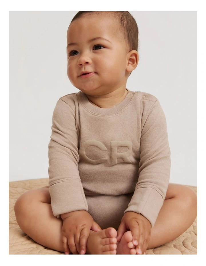 Organically Grown Cotton Puff Logo Long Sleeve Bodysuit in Mushroom
