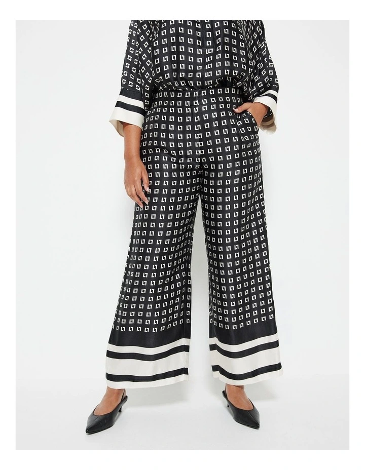 The Border Print Draped Pant in Black