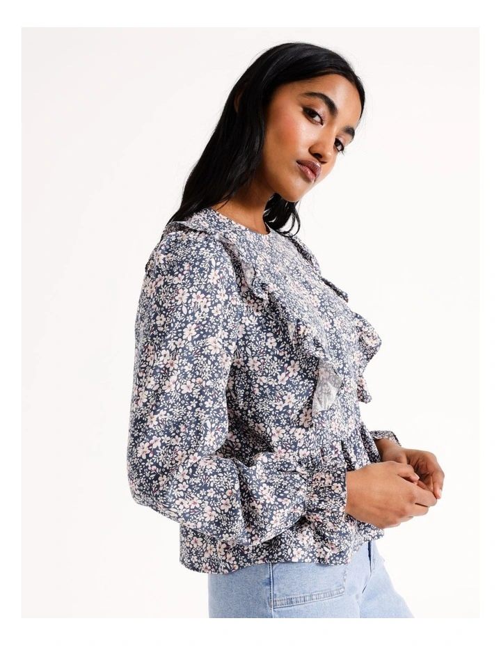 Eco Ruffle Shoulder Peplum Blouse in Multi
