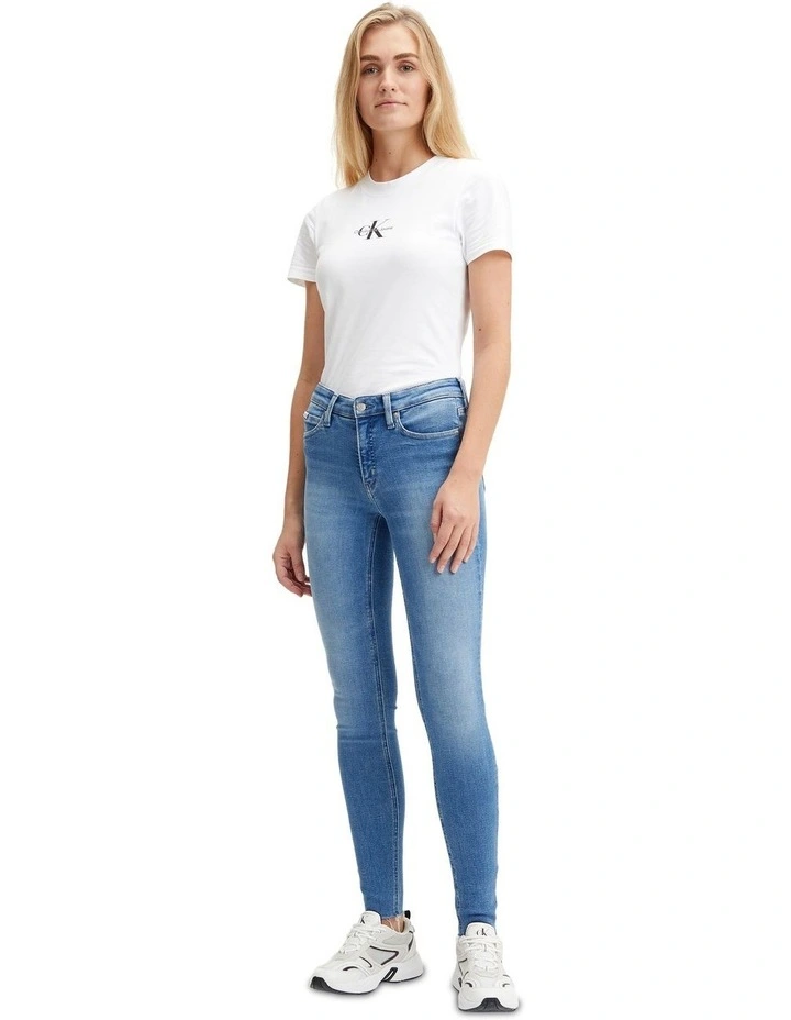 Mid Rise Skinny Jeans in Denim Medium