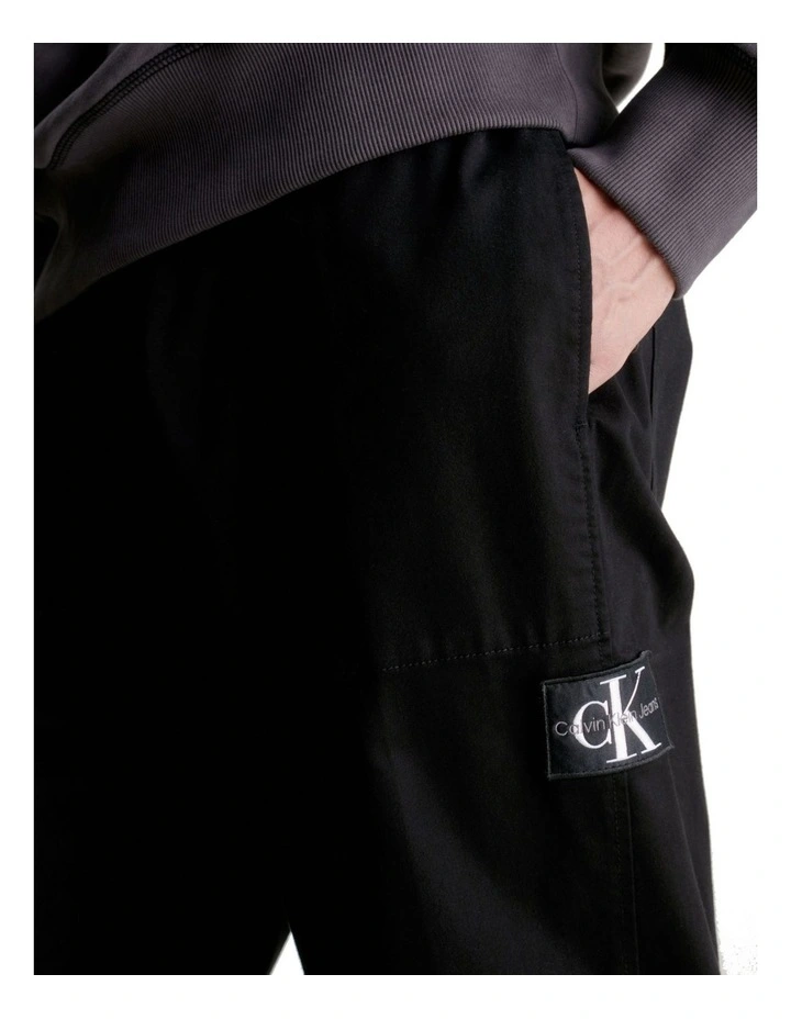 Badge Trim Woven Pant in Black