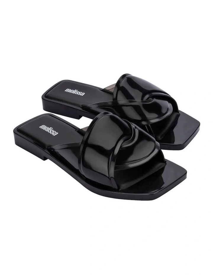 Melissa Brigitte Slides in Black