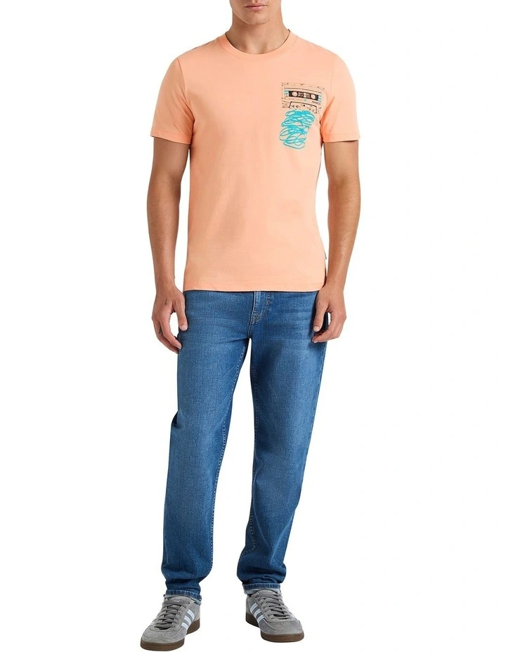 Whatever It Tapes Tee in Cantaloupe
