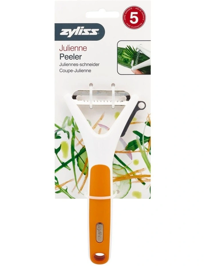 Julienne Peeler in Orange/White