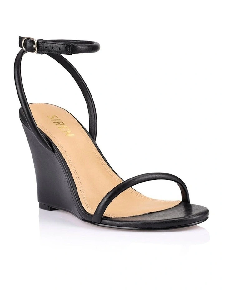 Bebe Wedge Sandals in Black