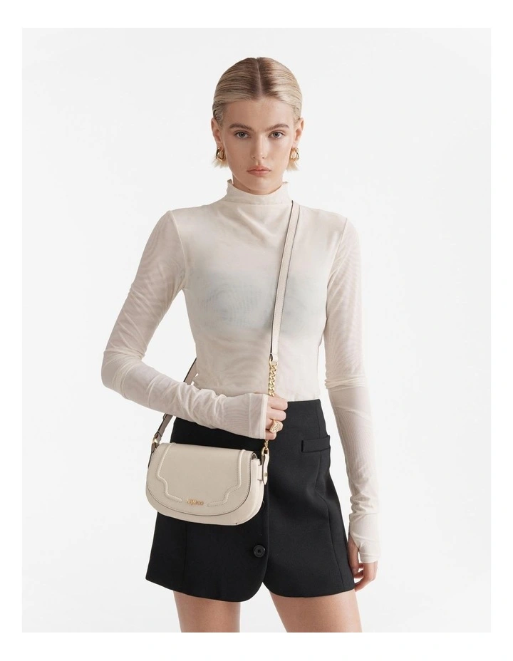 Treasure Saddle Crossbody Bag in Ivory