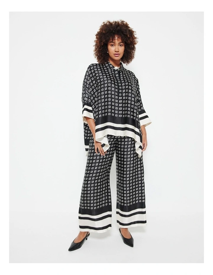 The Border Print Draped Pant in Black