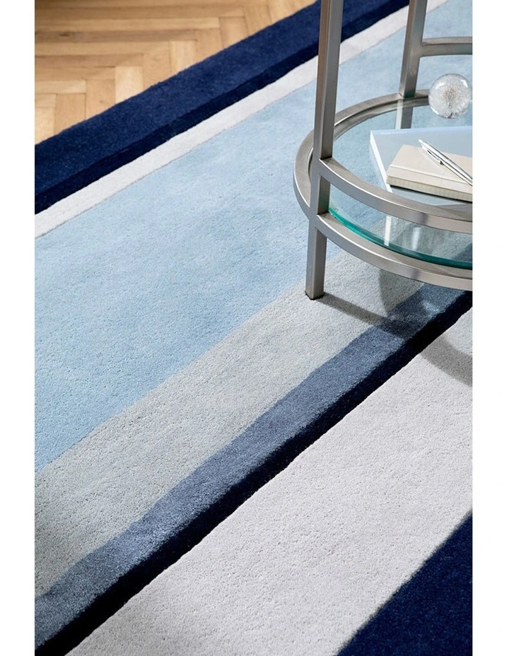 Eaton Dark Sea spray Rug in Blue