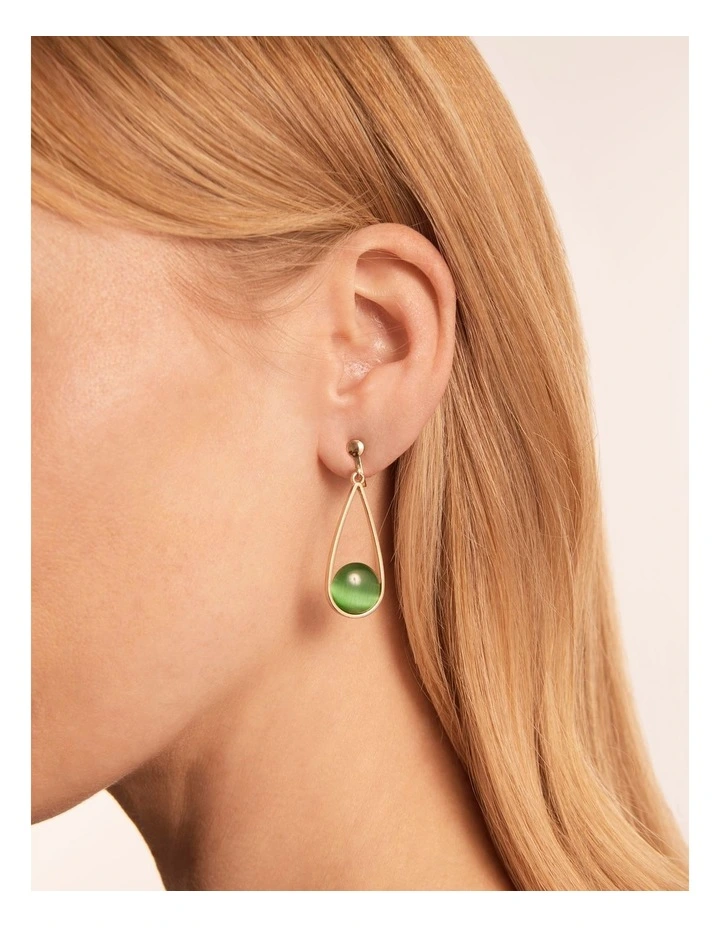 Cat Eye Pendulum Clip On Earrings in Emerald