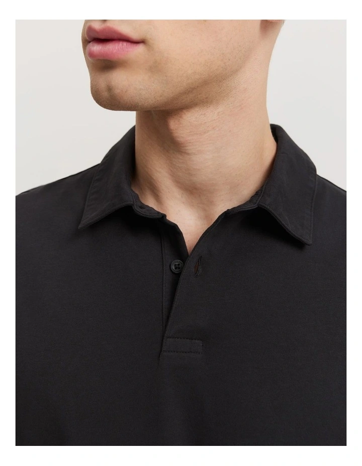 Garment Dyed Organically Grown Cotton Polo in Washed Black