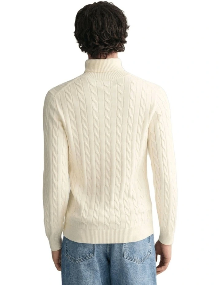 Cotton Cable Knit Turtleneck Sweater in Cream