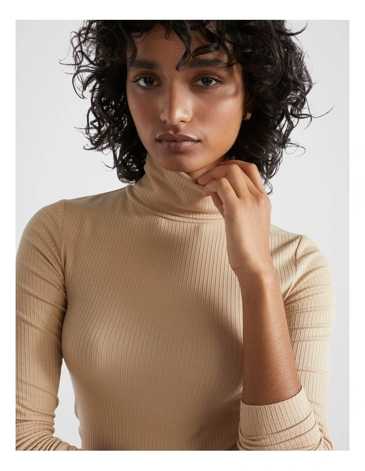 Core Rib Roll Neck Top in Champagne Beige