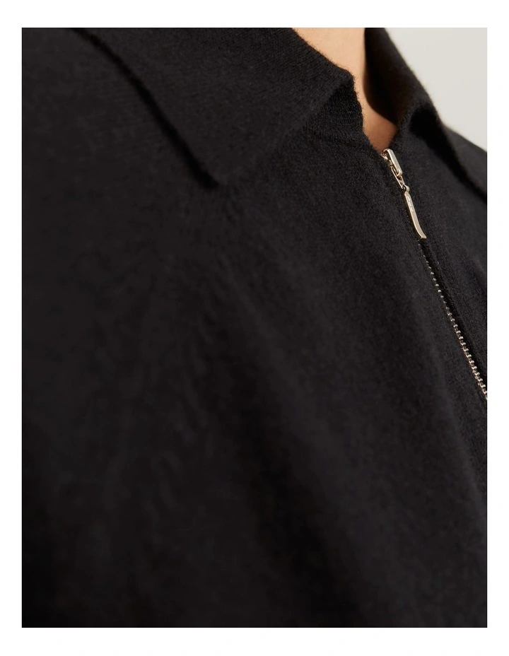 Gcs-certified Cashmere Blend Zip-through Knit Polo in Black