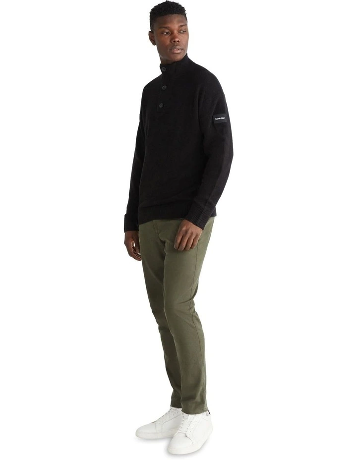 Lycra Blend Button Quarter Zip Knit Top in Black