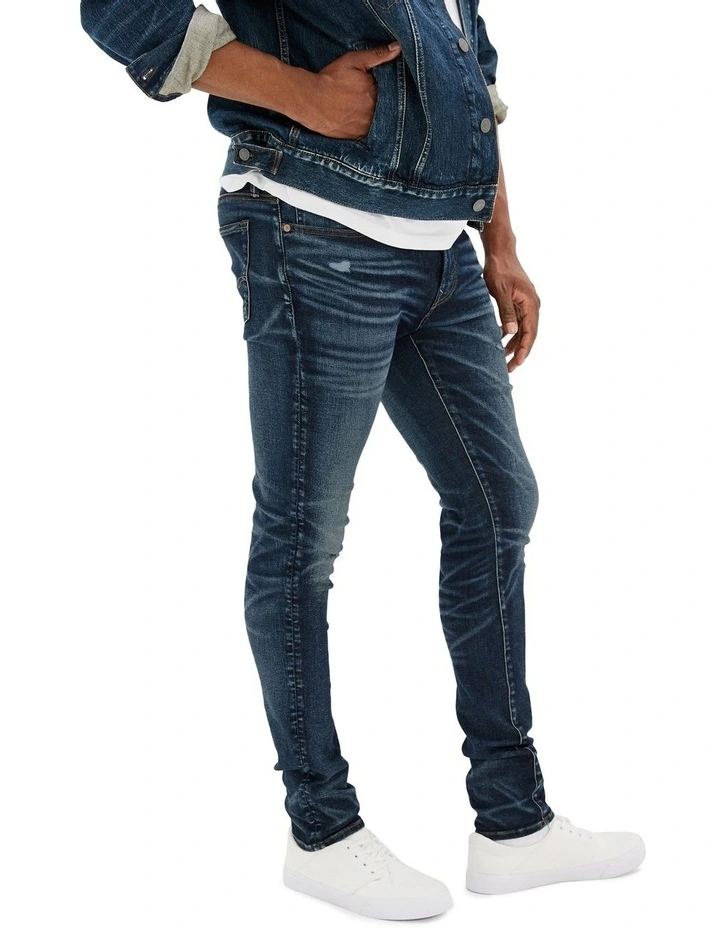 Airflex 360 Distressed Skinny Jean in Blue