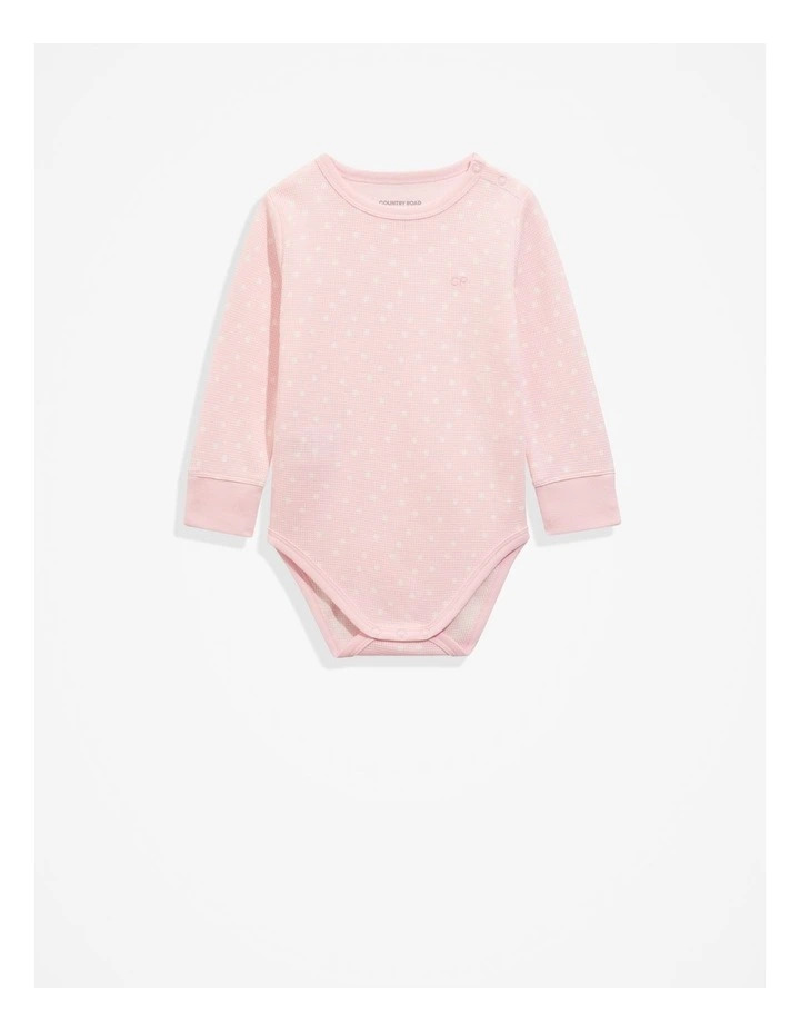 Organically Grown Cotton Waffle Long Sleeve Bodysuit in Pink Tint Spot