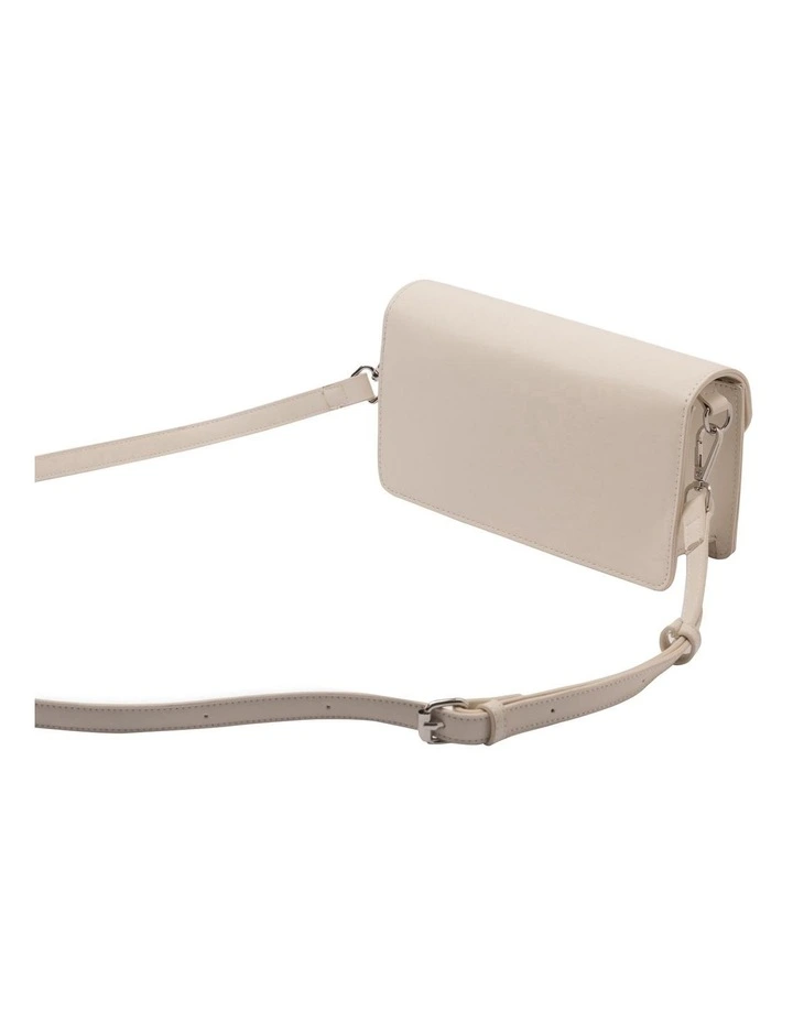 Violet Asymmetrical Crossbody Bag in Cream