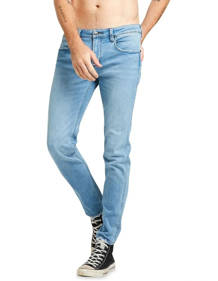 Stomper Low Rise Slim Tapered Jeans in Light Blue