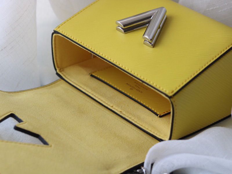 Louis Vuitton Epi Leather Twist Mini Bag In Yellow