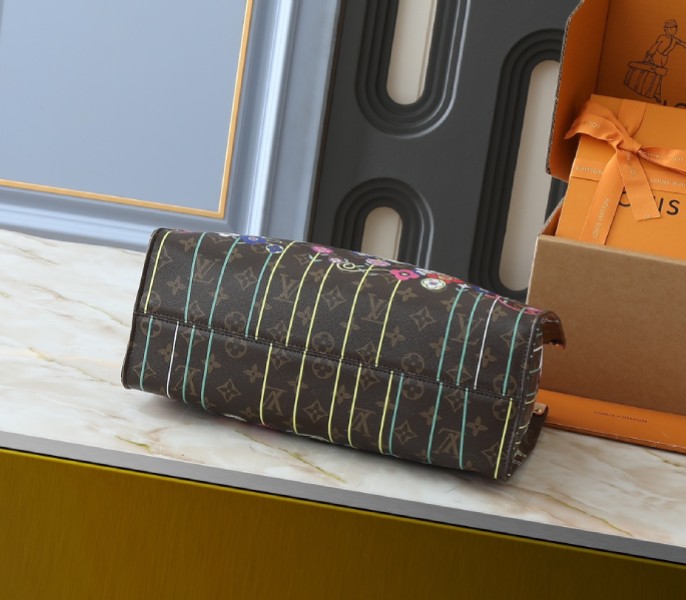 X TM Monogram Canvas Onthego MM