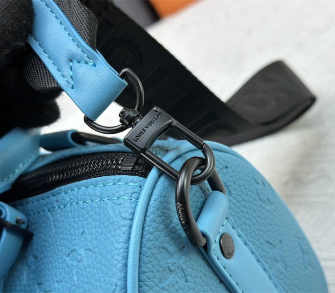 Louis Vuitton Taurillon Monogram Leather Keepall Bandouliere 25 In Turquoise