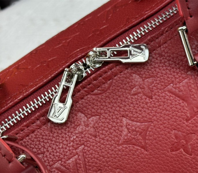 Louis Vuitton Taurillon Leather Keepall Bandouliere 50 In Sari Red