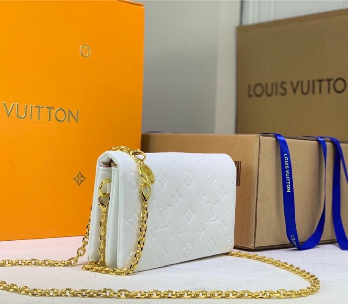 Louis Vuitton Coussin Pochette In Cream