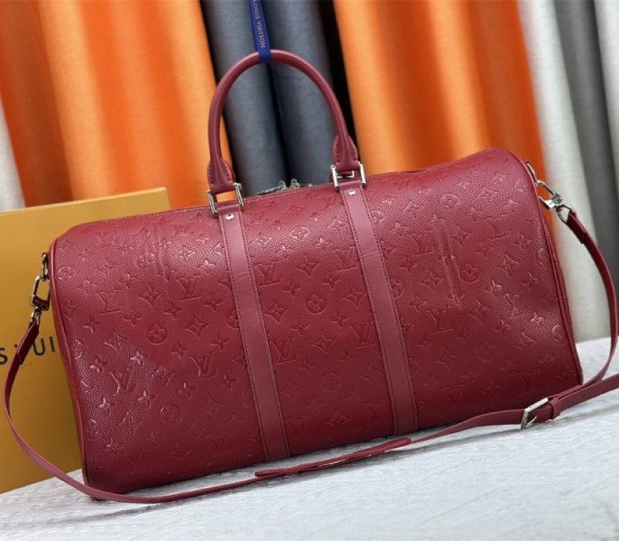 Louis Vuitton Taurillon Leather Keepall Bandouliere 50 In Sari Red