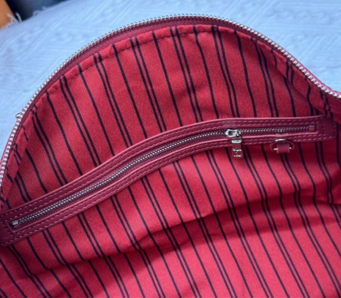 Louis Vuitton Taurillon Leather Keepall Bandouliere 50 In Sari Red