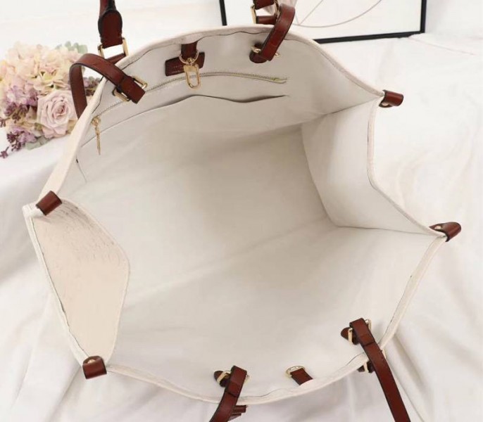 Louis Vuitton Monogram Empreinte Onthego GM Tote In Cream