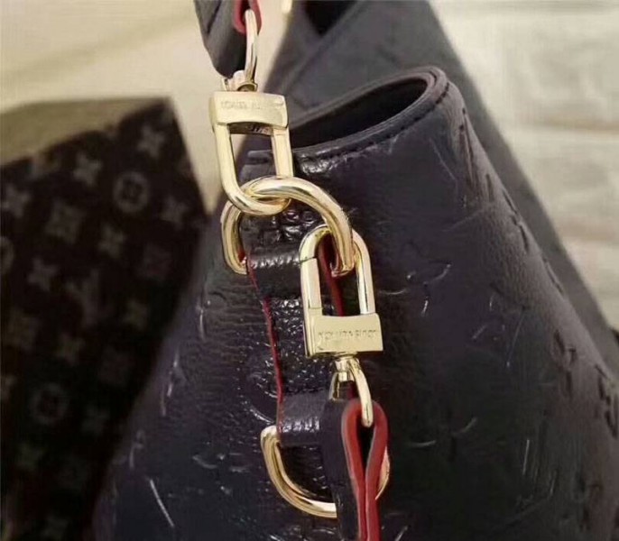 Louis Vuitton Monogram Empreinte Melie Hobo In Navy Blue