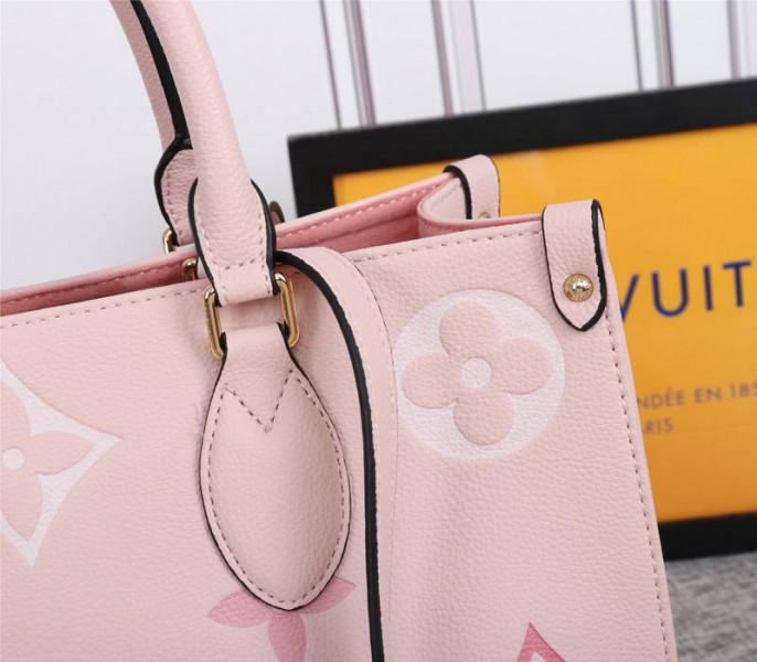 Louis Vuitton Monogram Empreinte Leather Onthego MM Bag In Pink