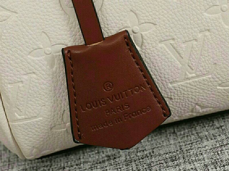 Louis Vuitton Monogram Empreinte Speedy Bandouliere 25 Handbag In Cream