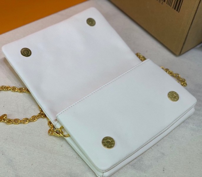 Louis Vuitton Coussin Pochette In Cream