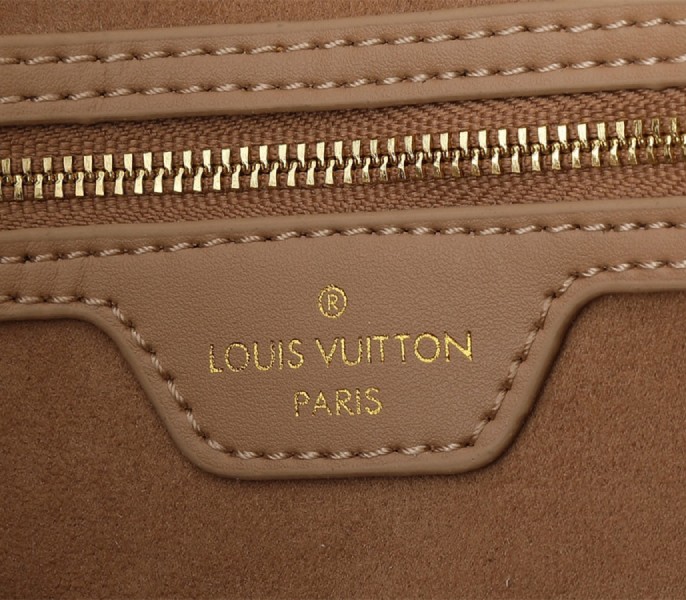 Louis Vuitton Monogram Empreinte Speedy Soft 30 Handbag In Apricot
