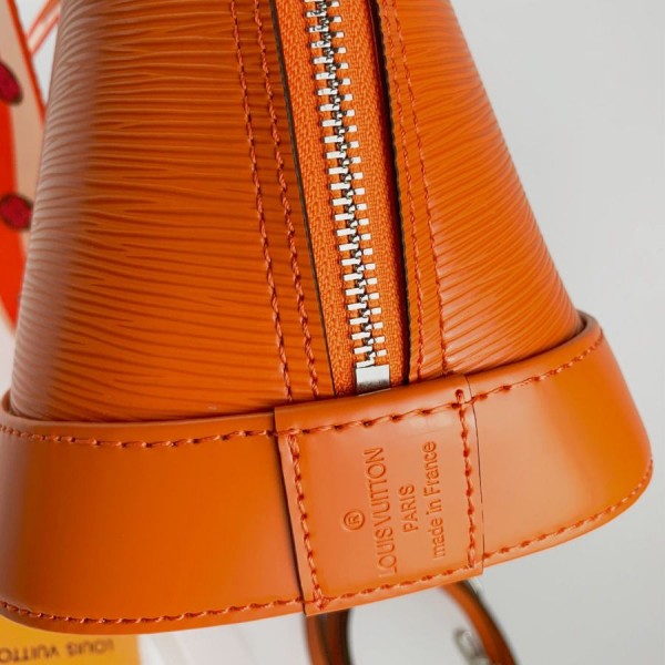 Louis Vuitton Epi Leather Alma PM Handbag In Orange With Jacquard Strap