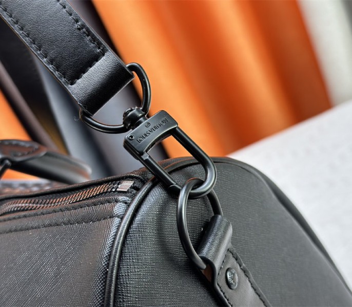 Louis Vuitton Taiga Leather Keepall Bandouliere 45 In Black And Monogram Macassar Canvas