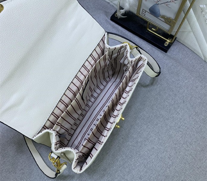 Monogram Empreinte Leather Metis In Cream M46552