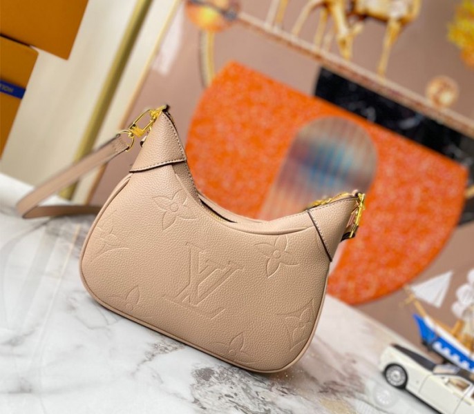 Louis Vuitton Monogram Empreinte Leather Bagatelle Mini Hobo In Beige