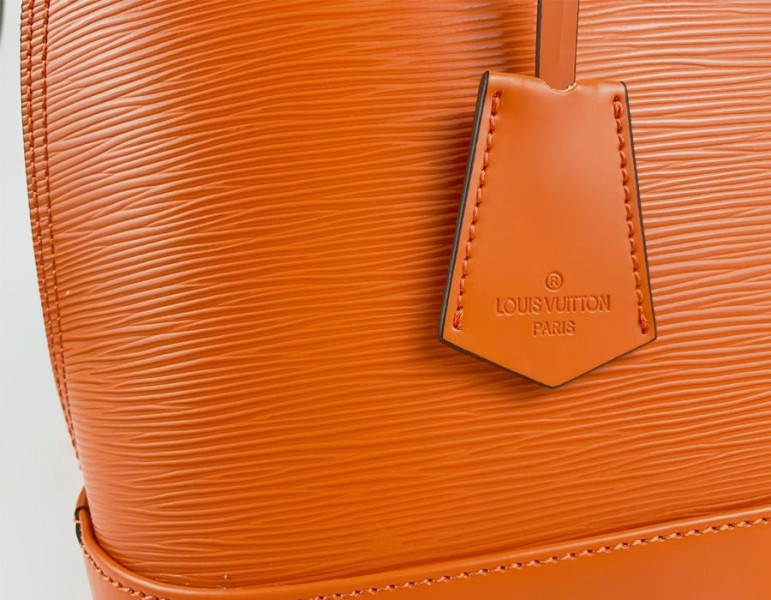 Louis Vuitton Epi Leather Alma PM Handbag In Orange With Jacquard Strap
